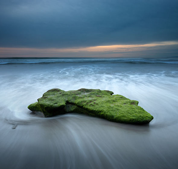 Color photograph of stones in Lake Henshaw, San Diego
