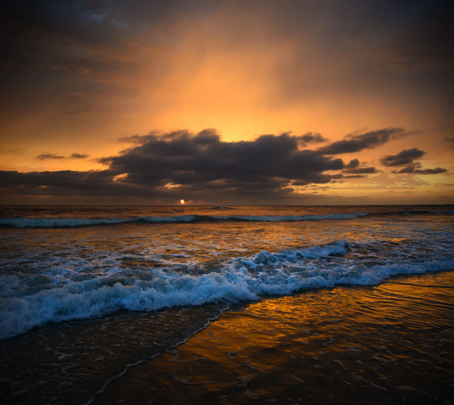 Color photograph of a bright sunset in Torrey Pines, San Diego