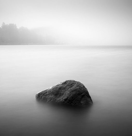 Black and white photo of a stone in Lake Cuyamaca, San Diego