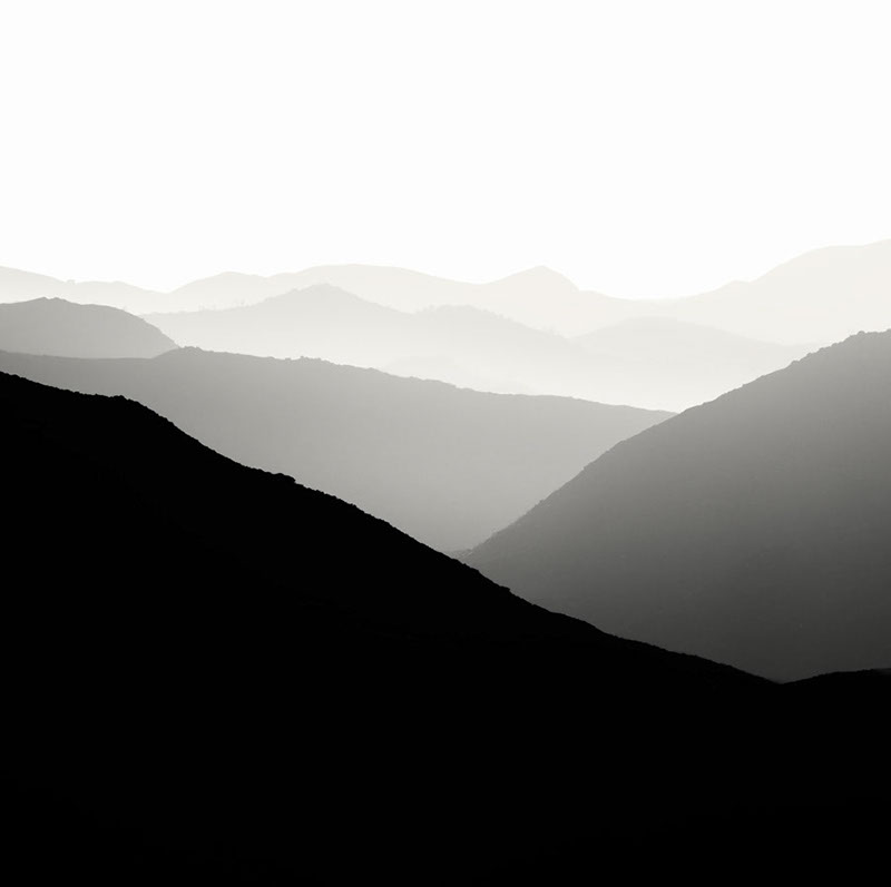 Black and white photo of layered mountains in Ramona, San Diego