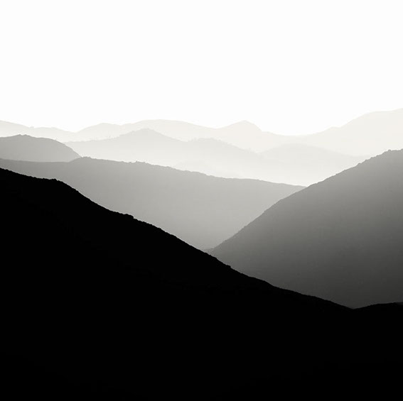 Black and white photo of layered mountains in Ramona, San Diego
