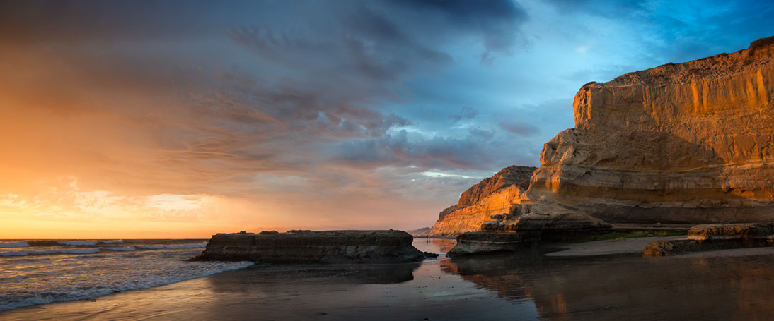 Color photo of a stormy sunset in Torrey Pines, San Diego