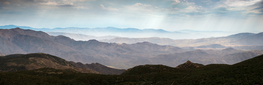 Color photo of boats and the Coronado Bridge in San Diego Bay