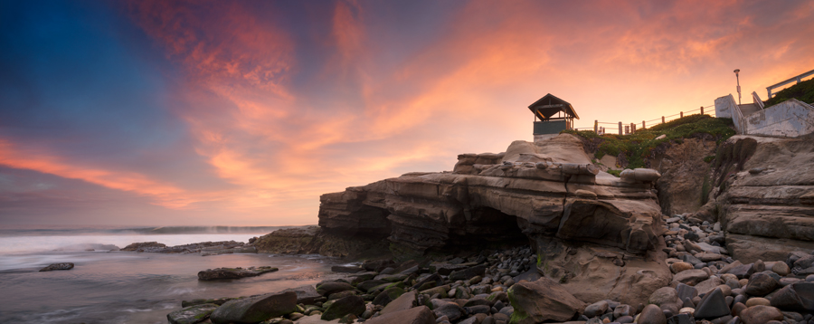 Color photo of boats and the Coronado Bridge in San Diego Bay